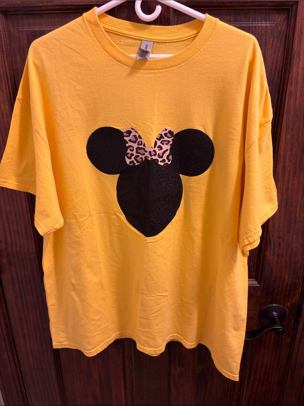 Gildan Yellow woman’s Tee with black sparkly Minnie Silhouette and Leopard Bow